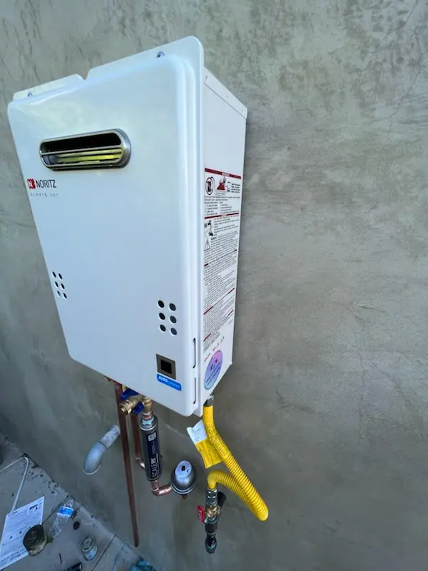 Tankless water heater installation for Granger West homes